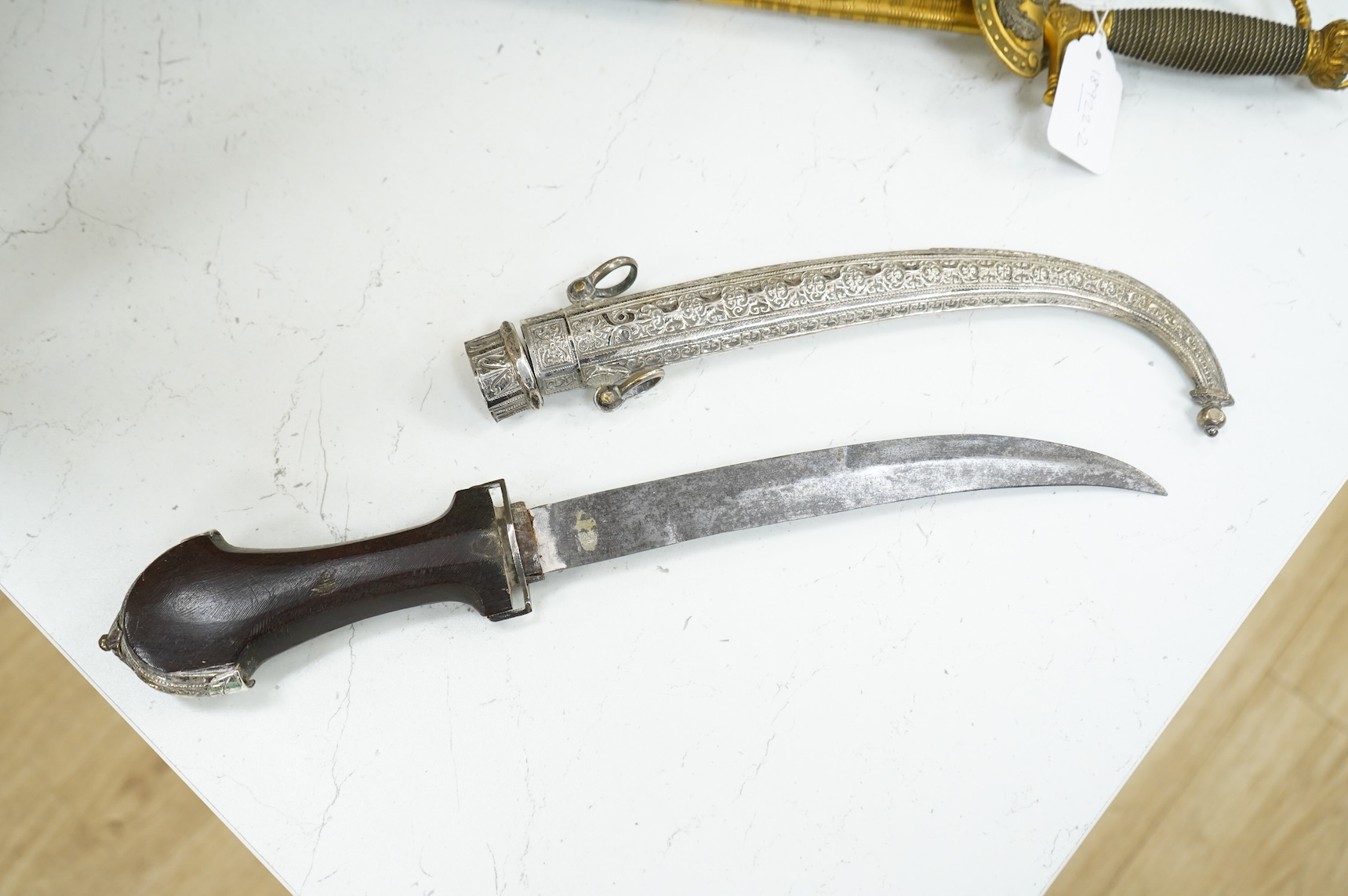 A cased Moroccan hallmarked silver mounted hardwood handled dagger jambya, overall length 42cm